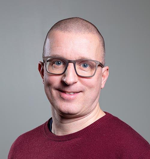 SASKin työntekijä Juha Vauhkonen kasvokuvassa