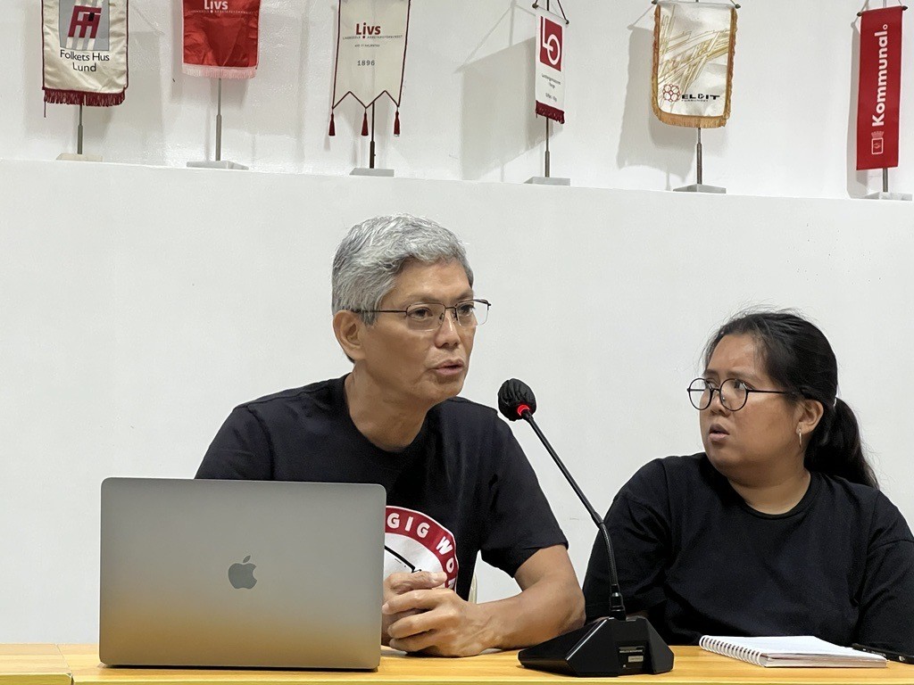 Filippiinien ammattiliittojen SENTRO-keskusjärjestön johtajat Josua Mata ja Nice Coronación